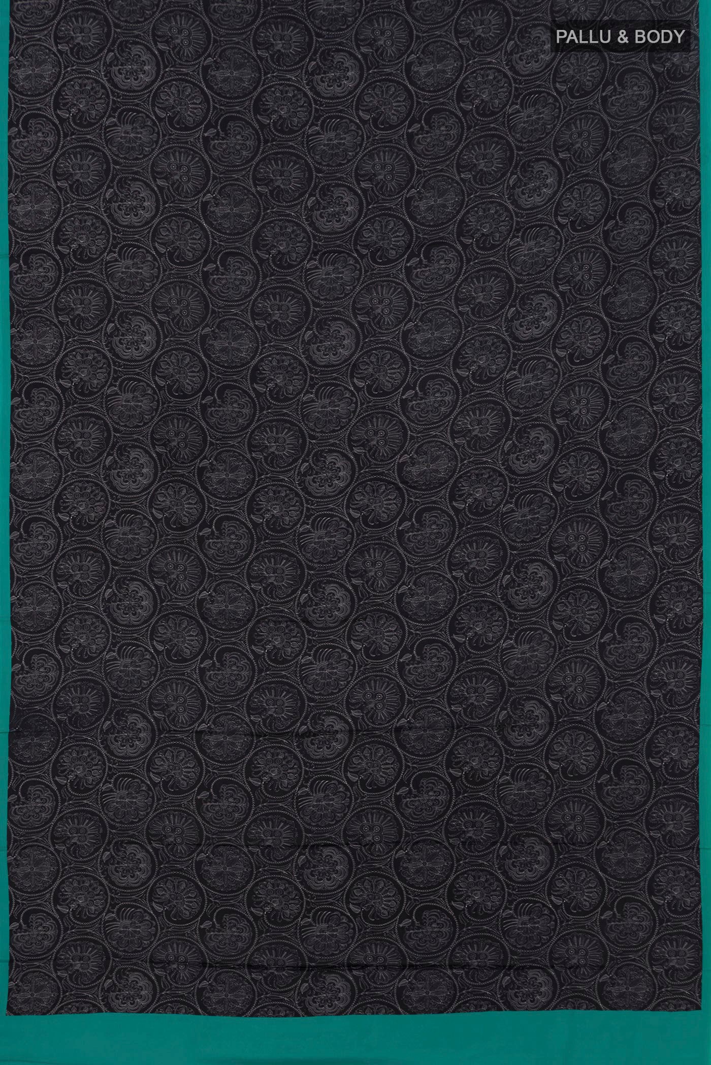 Flat view of Black Printed Silk Saree with Printed design on the body and Plain Border. 