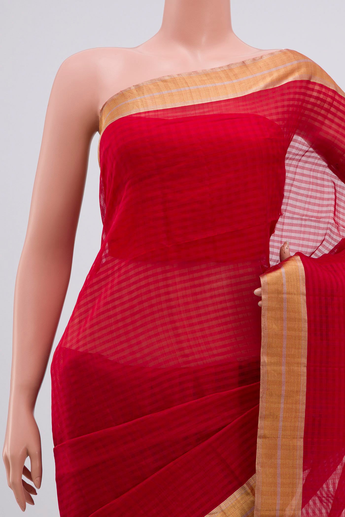 Border image of Red Silk Cotton Saree with Checked design on the body and Zari Border. 
