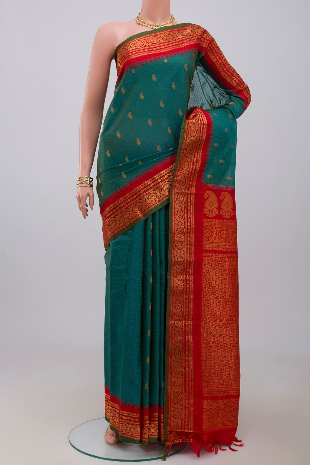Blue Gadwal Silk Cotton Saree with Checked design on the body and Zari Border.  displayed on a mannequin