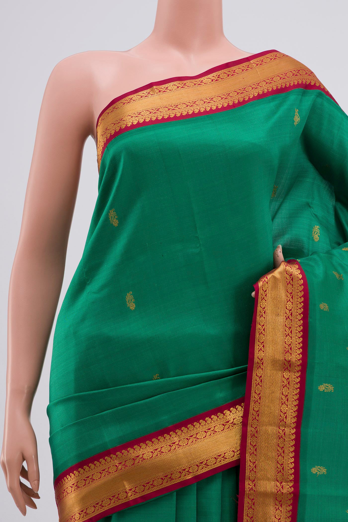 Border image of Pure Silk Pure Zari Green Kanchipuram Saree with Zari Butta on the body and Zari Border. 