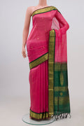 Pink Coimbatore Silk Cotton Saree with Zari Butta on the body and Zari Border.  displayed on a mannequin