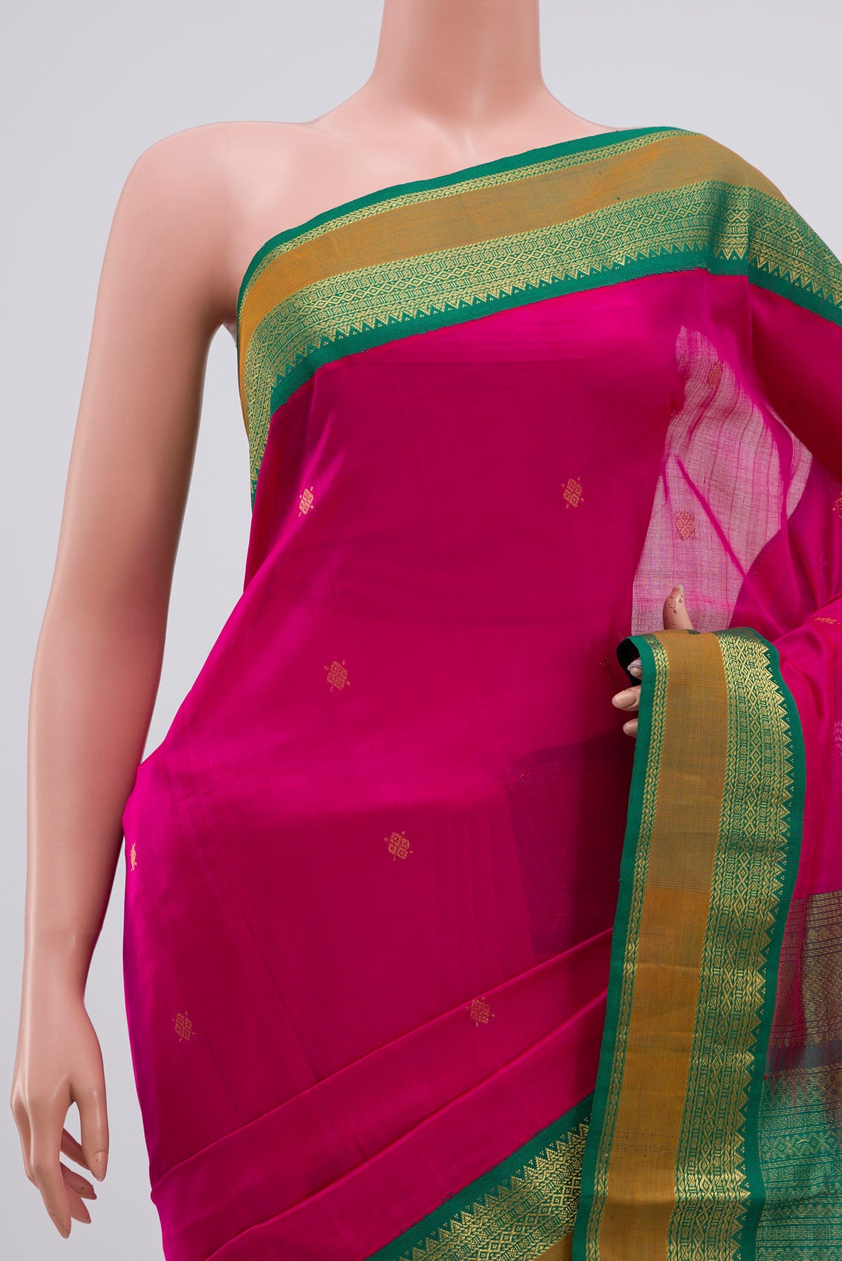 Border image of Rani Pink Coimbatore Silk Cotton Saree with Zari Butta on the body and Zari Border. 