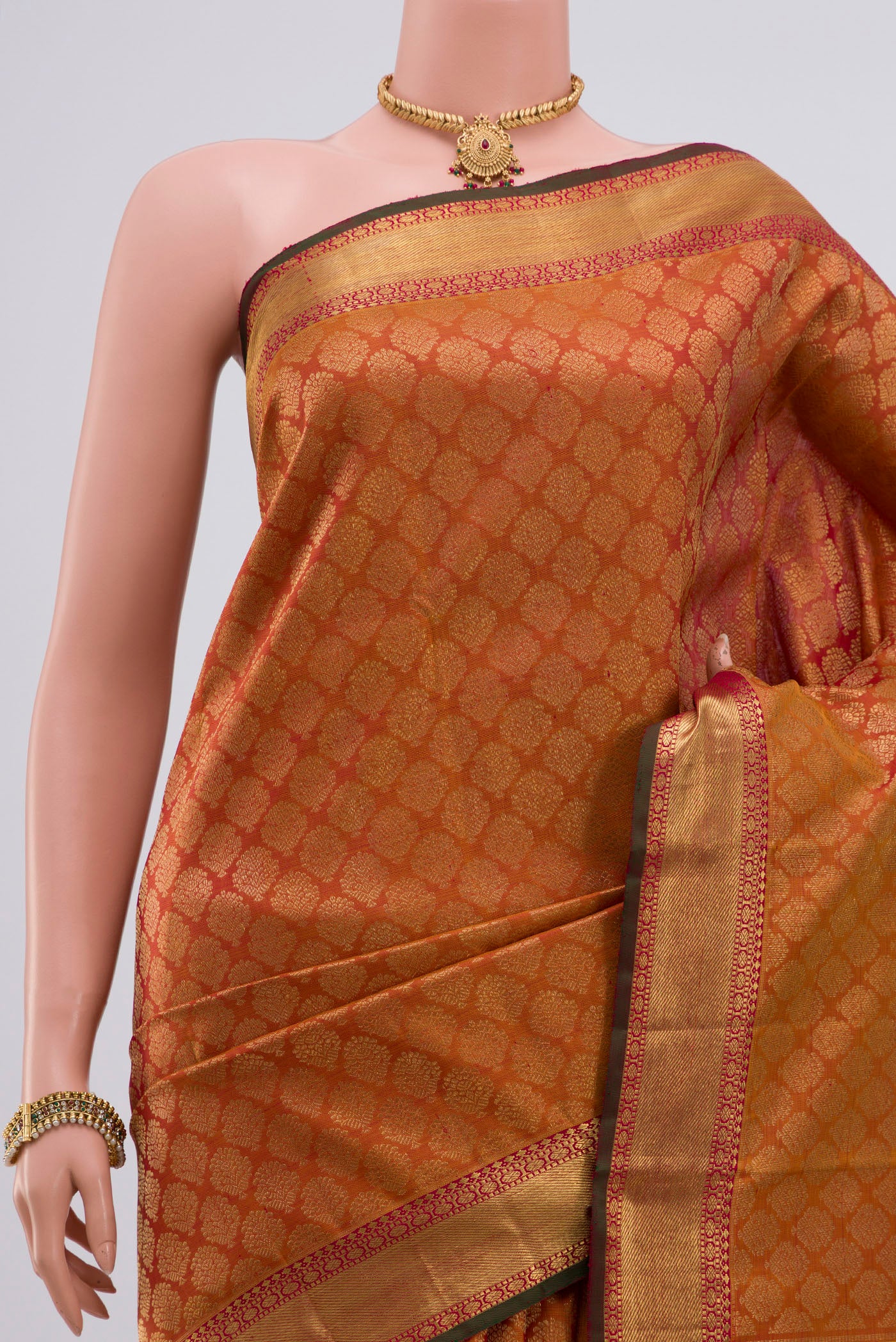 Border image of Pure Silk Pure Zari Orange Kanjivaram Saree with Zari Brocade on the body and Zari Border. 