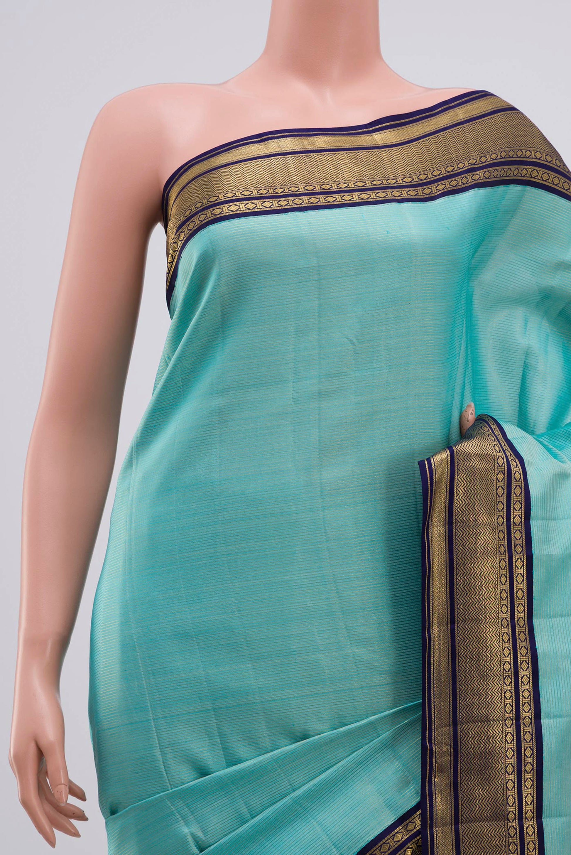 Border image of Pure Silk Pure Zari Sky Blue Kanchipuram Saree with Stripes on the body and Zari Border. 