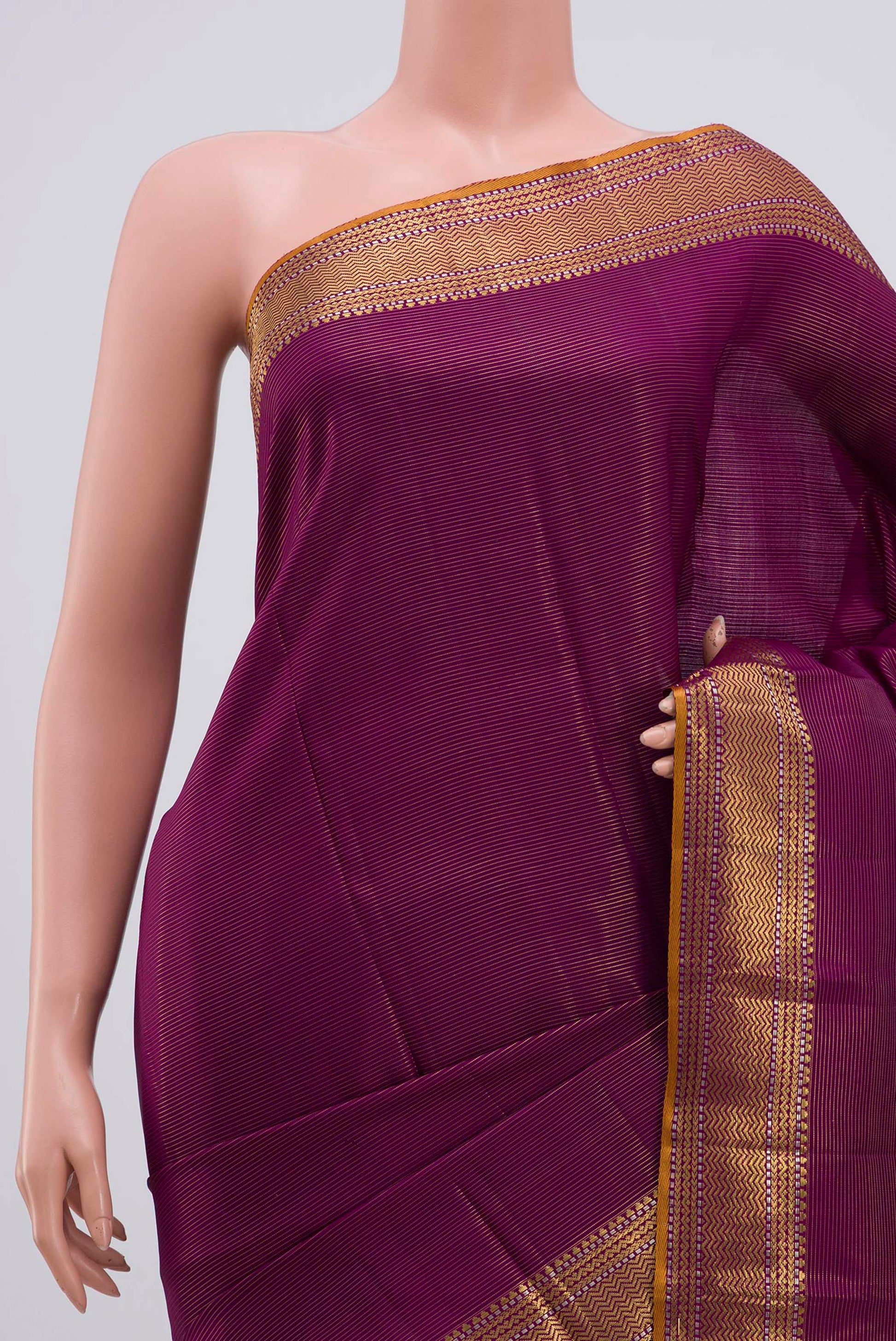 Border image of Magenta Kanjivaram Silk Saree with Stripes on the body and Zari Border. 