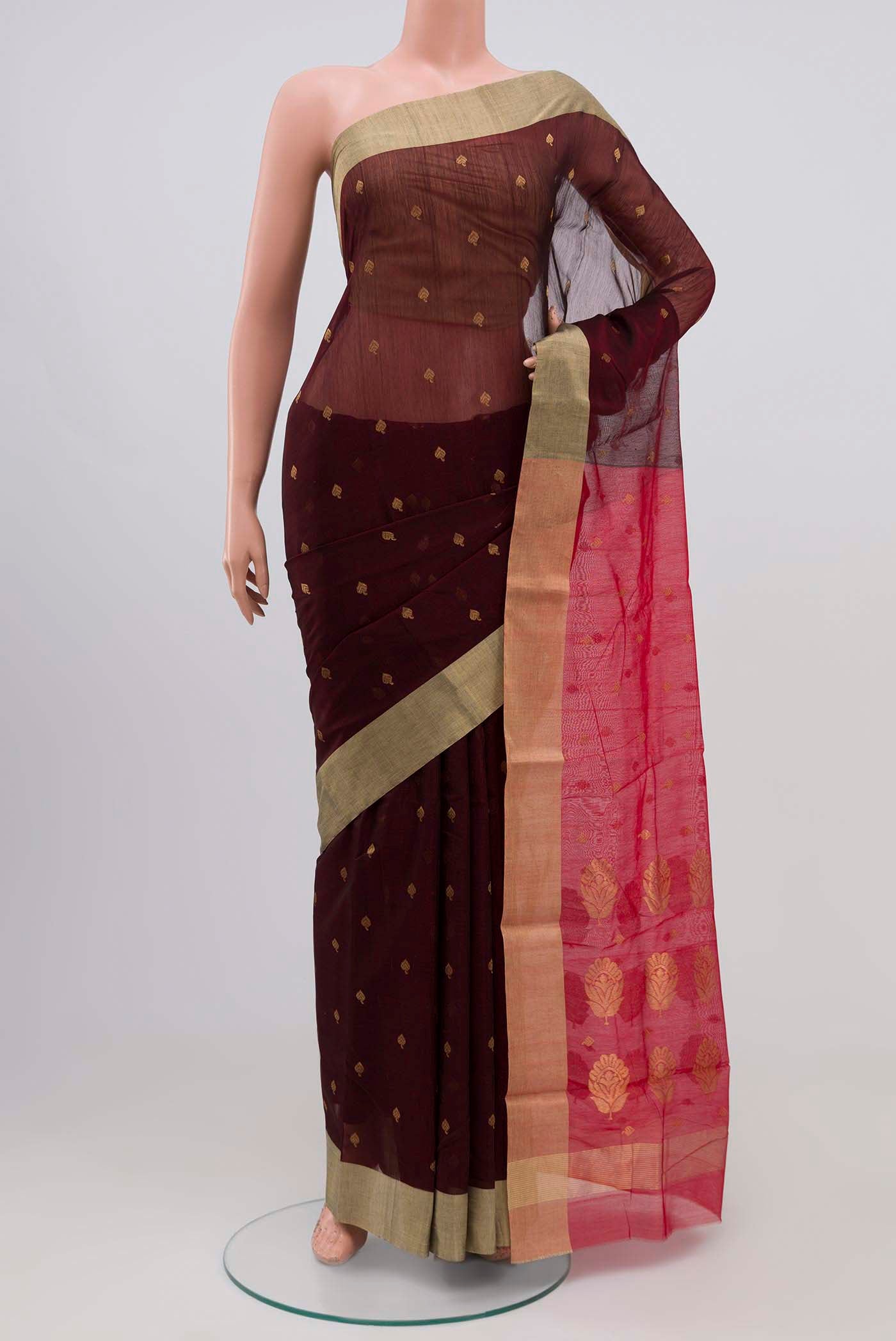 Maroon Chanderi Silk Cotton Saree with Zari Butta on the body and Zari Border.  displayed on a mannequin
