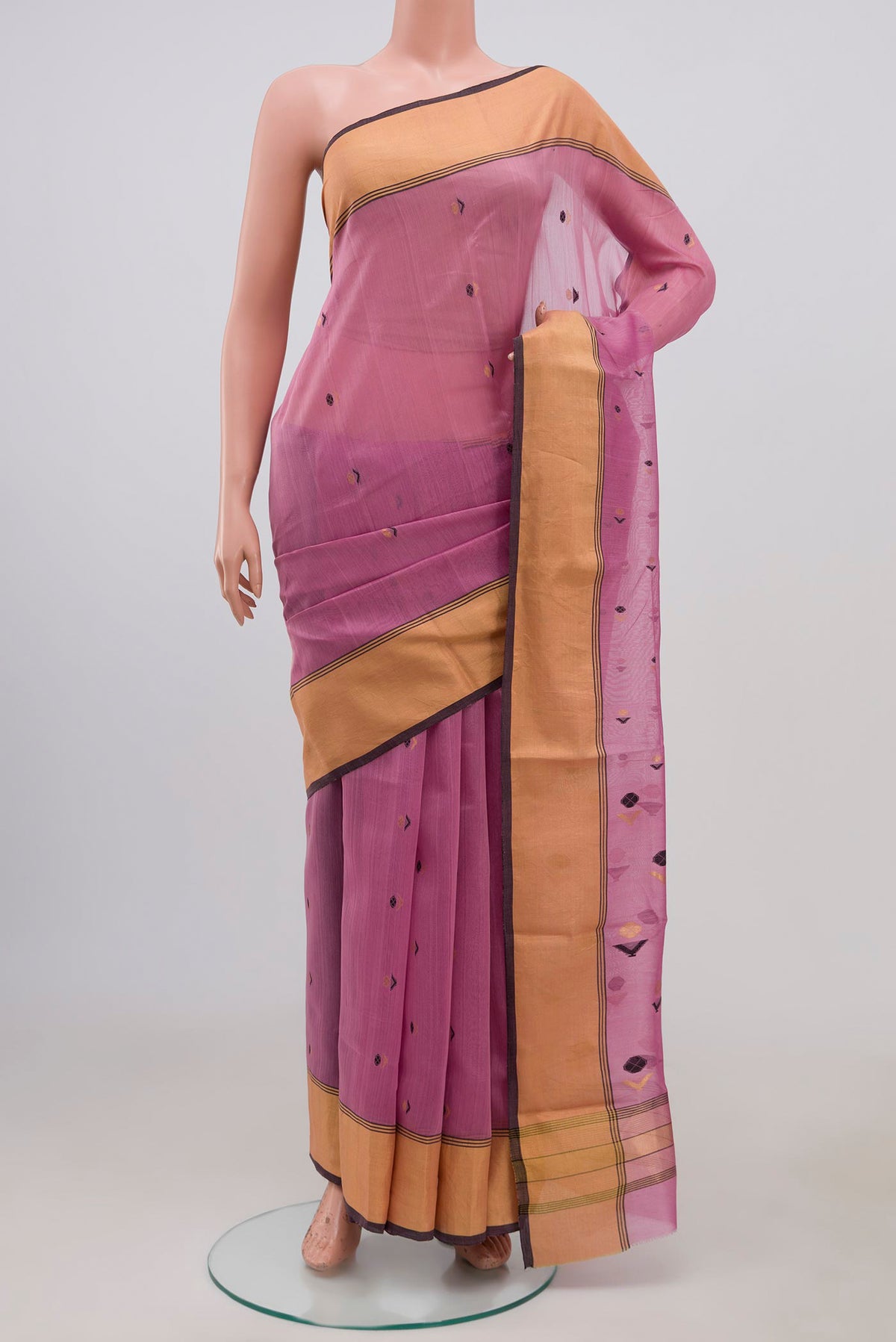 Pink Chanderi Silk Cotton Saree with Zari Butta on the body and Zari Border.  displayed on a mannequin