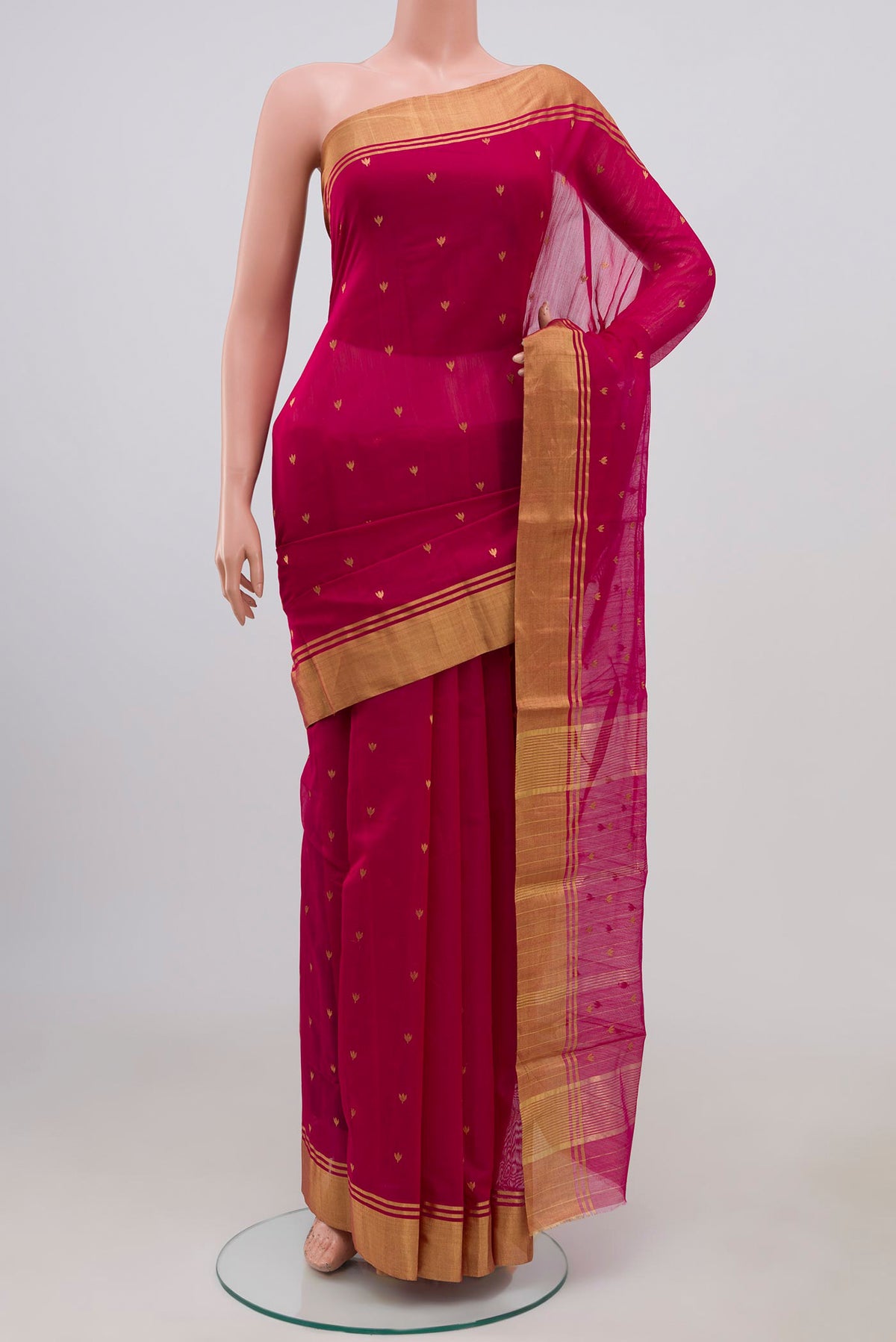 Pink Chanderi Silk Cotton Saree with Zari Butta on the body and Zari Border.  displayed on a mannequin
