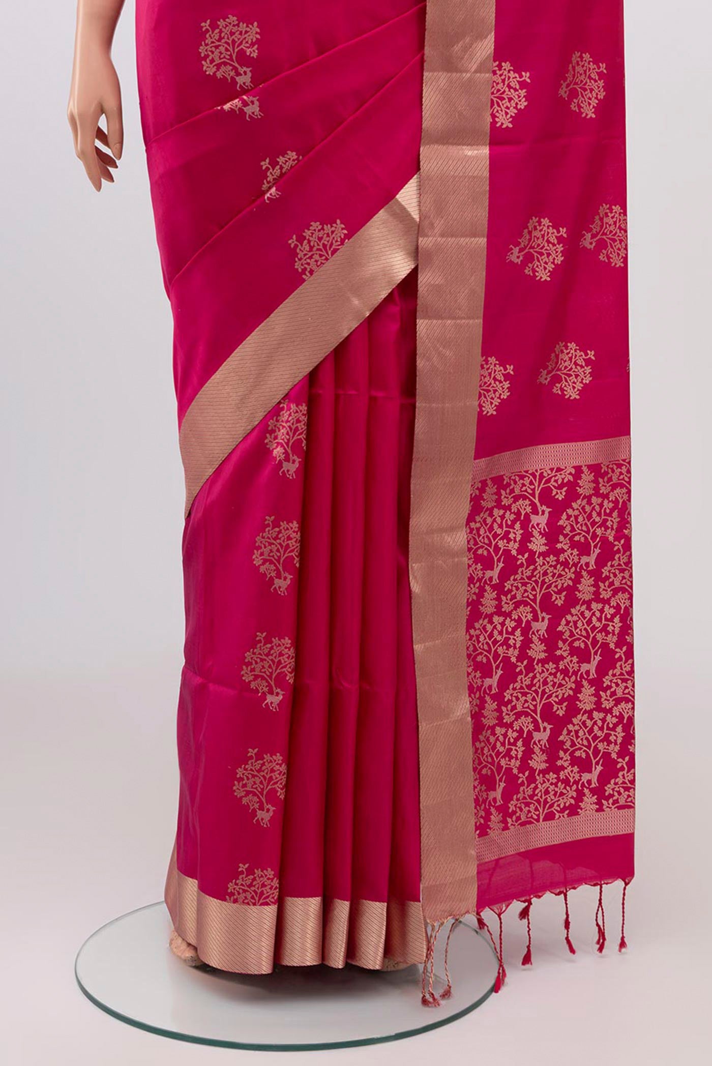 Pleats and pallu of Pink Soft Silk Saree with Zari Butta on the body and Zari Border. 