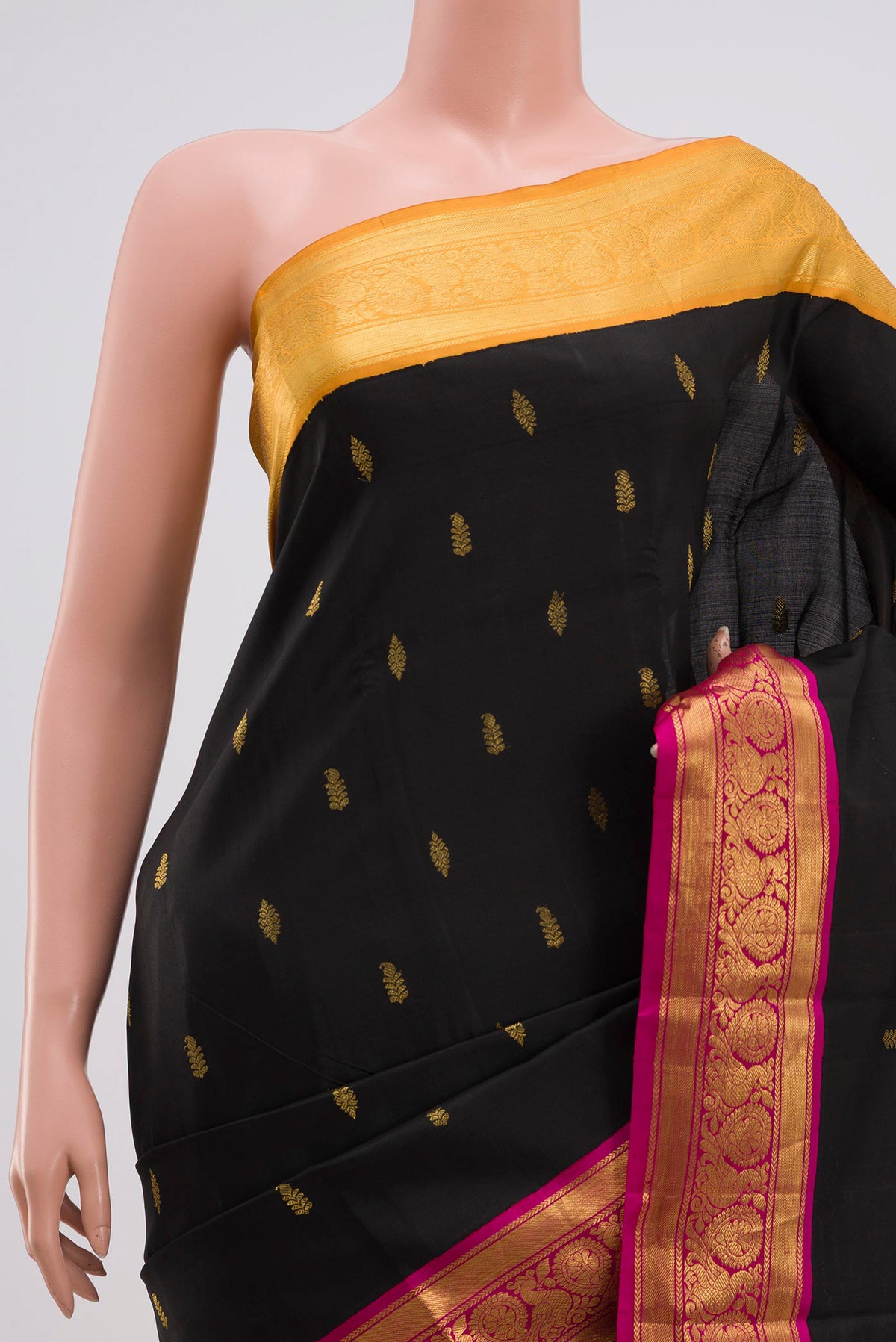 Border image of Pure Silk Pure Zari Black Kanjivaram Saree with Zari Butta on the body and Zari Border. 