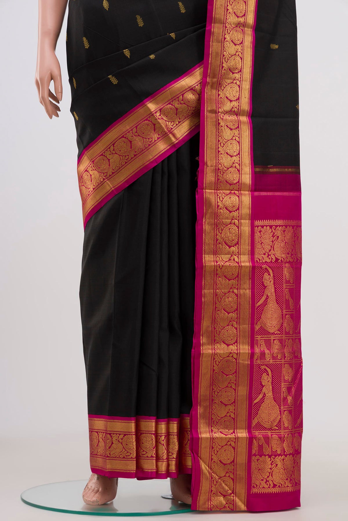 Pleats and pallu of Pure Silk Pure Zari Black Kanjivaram Saree with Zari Butta on the body and Zari Border. 