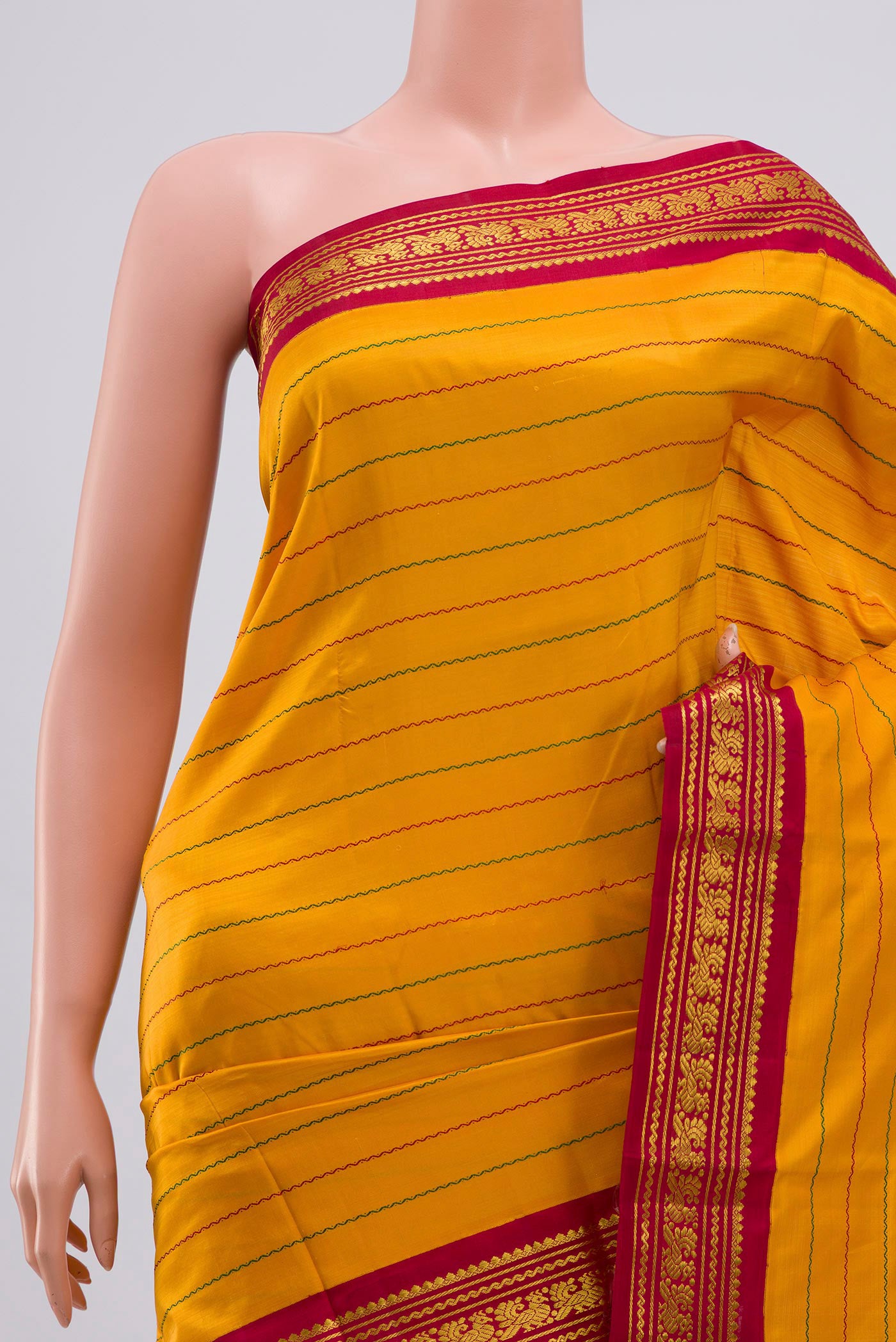 Border image of Pure Silk Pure Zari Mustard Kanjivaram Saree with Veldhari on the body and Zari Border. 