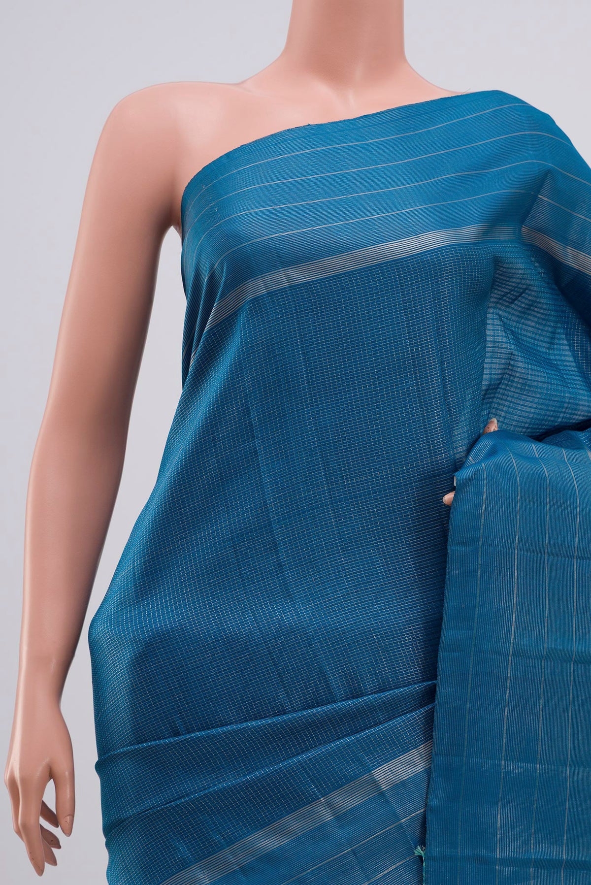 Border image of Pure Silk Pure Zari Blue Kanchipuram Saree with Checked design on the body and Thin Zari Line. 