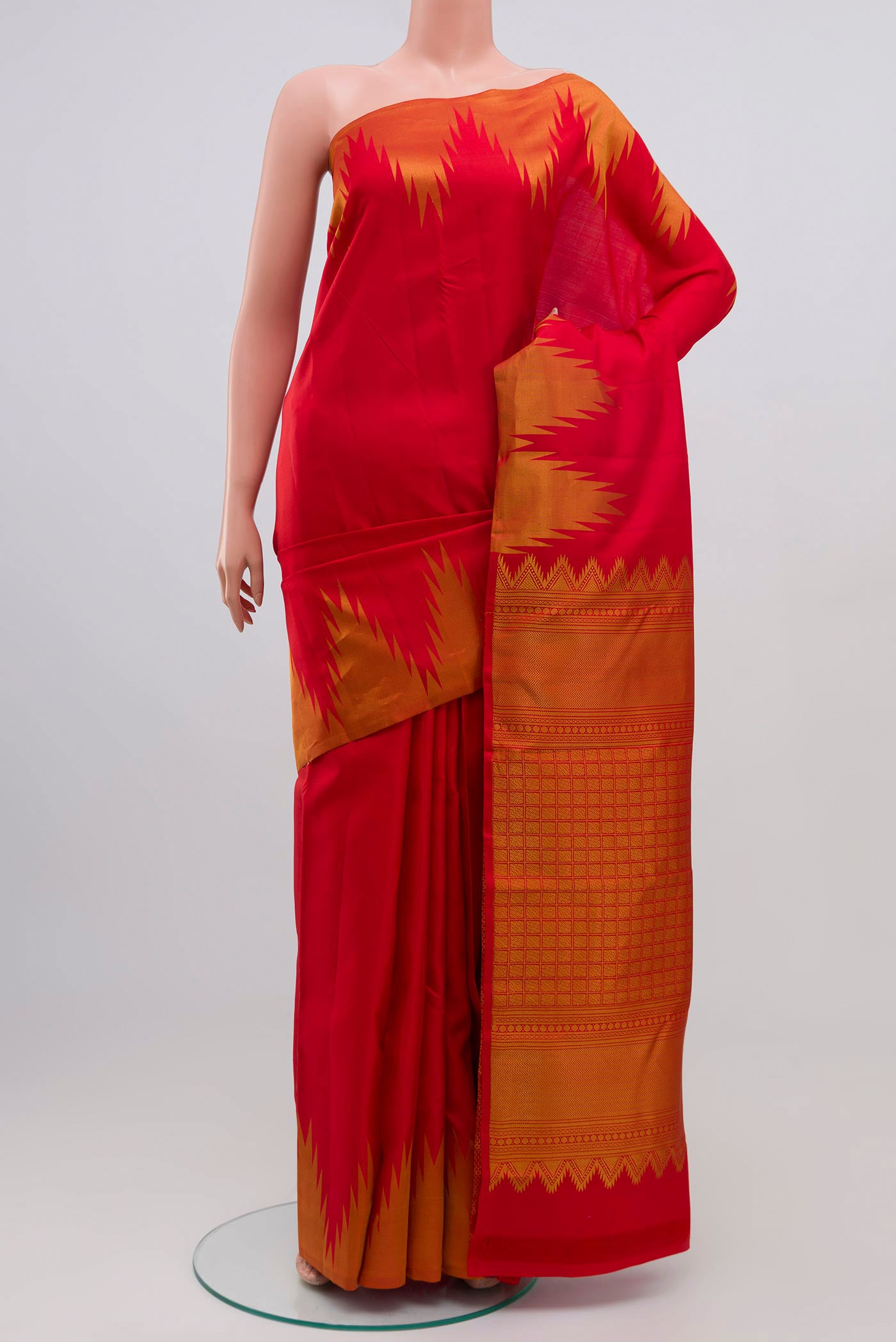 Red Kanchipuram Silk Saree with Plain Body and Temple Border.  displayed on a mannequin