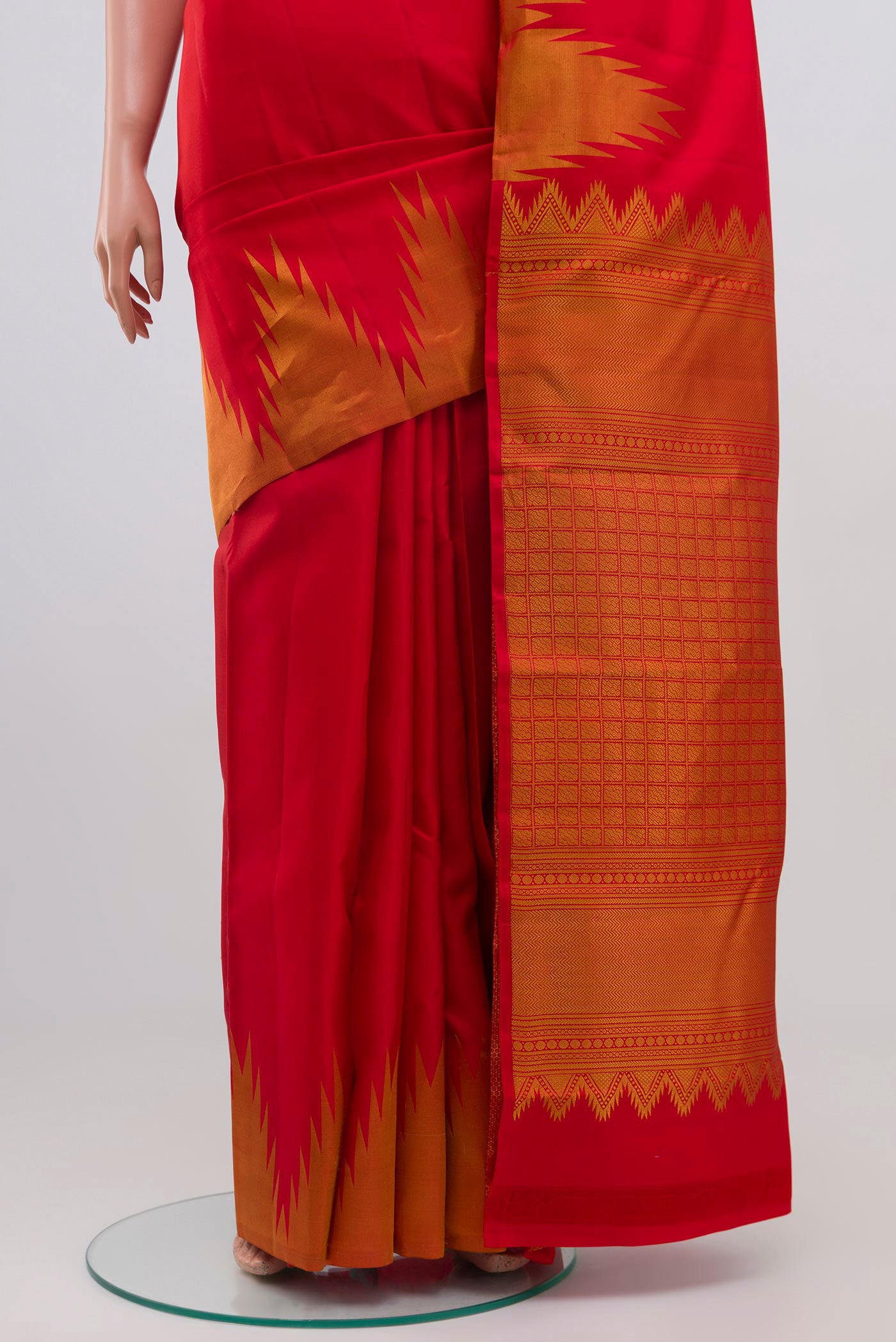 Pleats and pallu of Red Kanchipuram Silk Saree with Plain Body and Temple Border. 