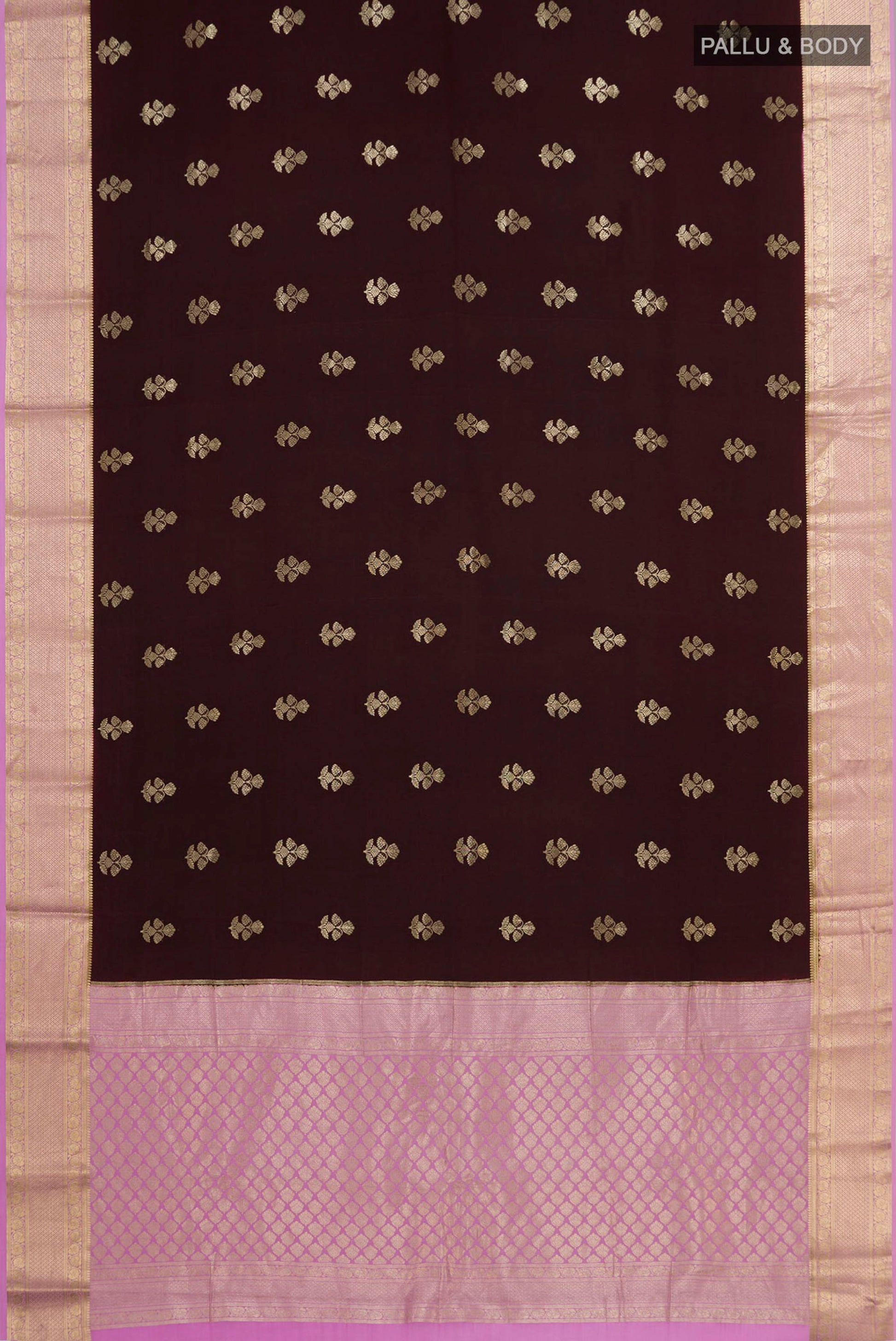 Flat view of Brown Crepe Saree with Zari Butta on the body and Zari Border. 