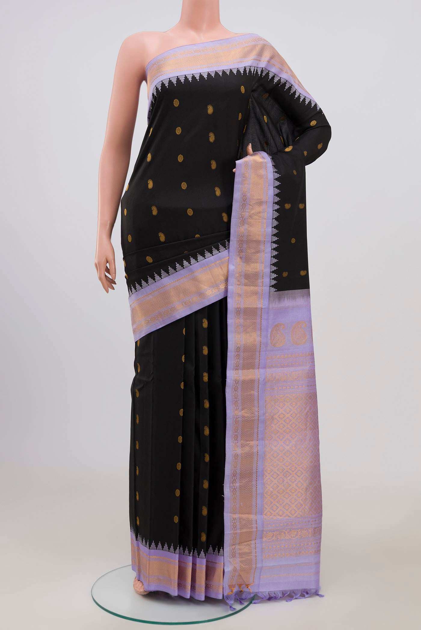 Black Gadwal Silk Saree with Zari Butta on the body and Zari Border.  displayed on a mannequin