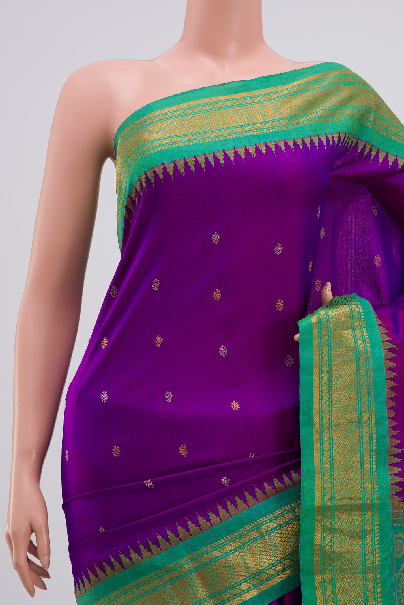 Border image of Purple Gadwal Silk Saree with Zari Butta on the body and Zari Border. 