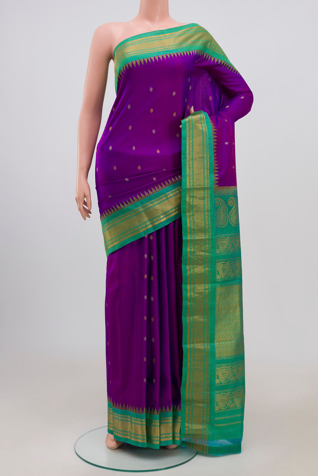 Purple Gadwal Silk Saree with Zari Butta on the body and Zari Border.  displayed on a mannequin