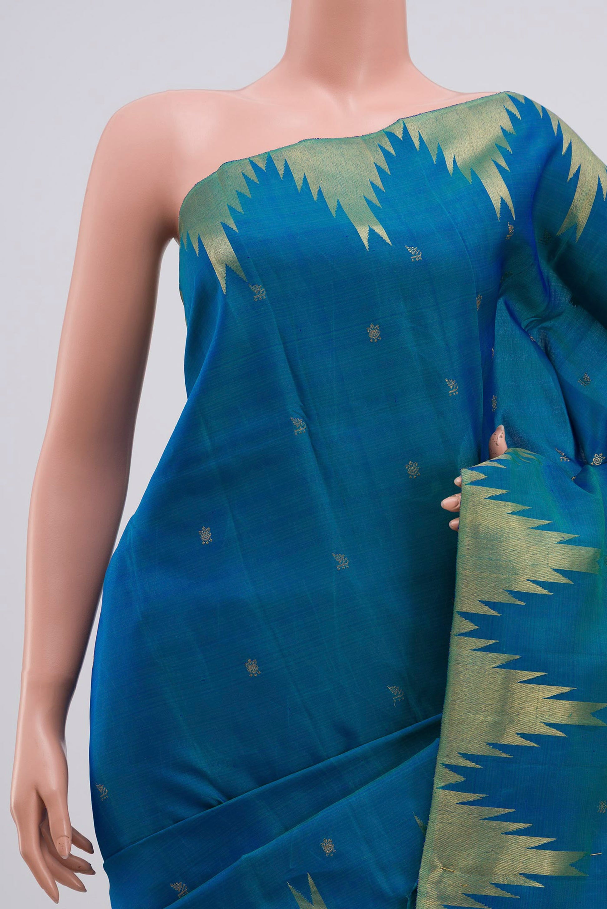 Border image of Pure Silk Pure Zari Peacock Blue Kanchipuram Saree with Zari Butta on the body and Temple Border. 