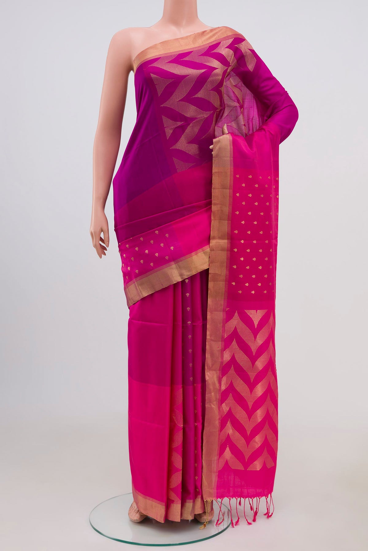 Pink Soft Silk Saree with Checked design on the body and Zari Border.  displayed on a mannequin