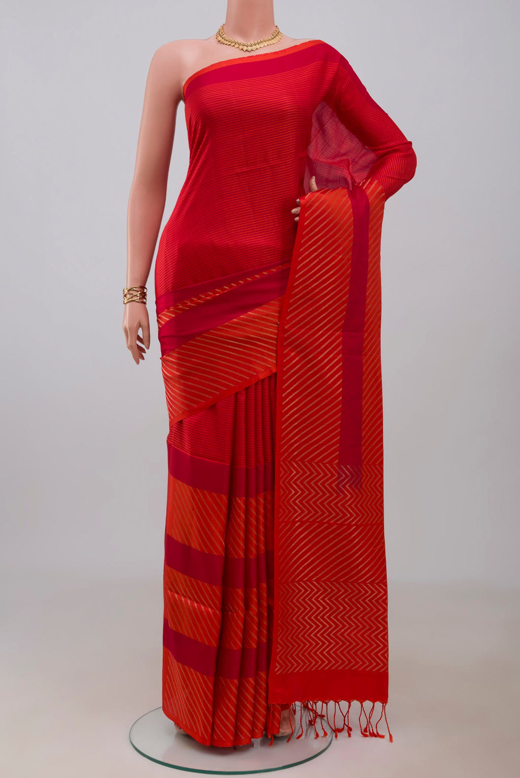 Multi Color Soft Silk Saree with Stripes on the body and Without Border.  displayed on a mannequin