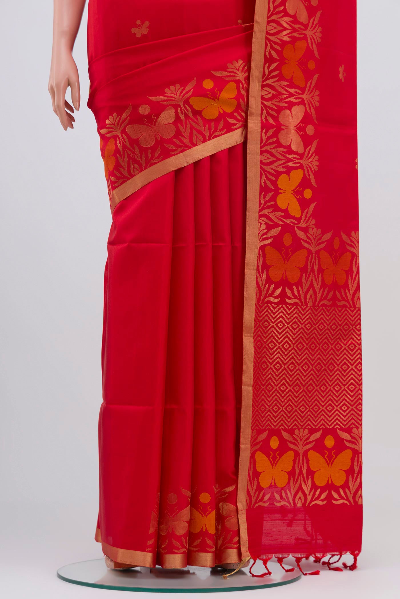 Pleats and pallu of Red Soft Silk Saree with Zari Butta on the body and Fancy Border. 