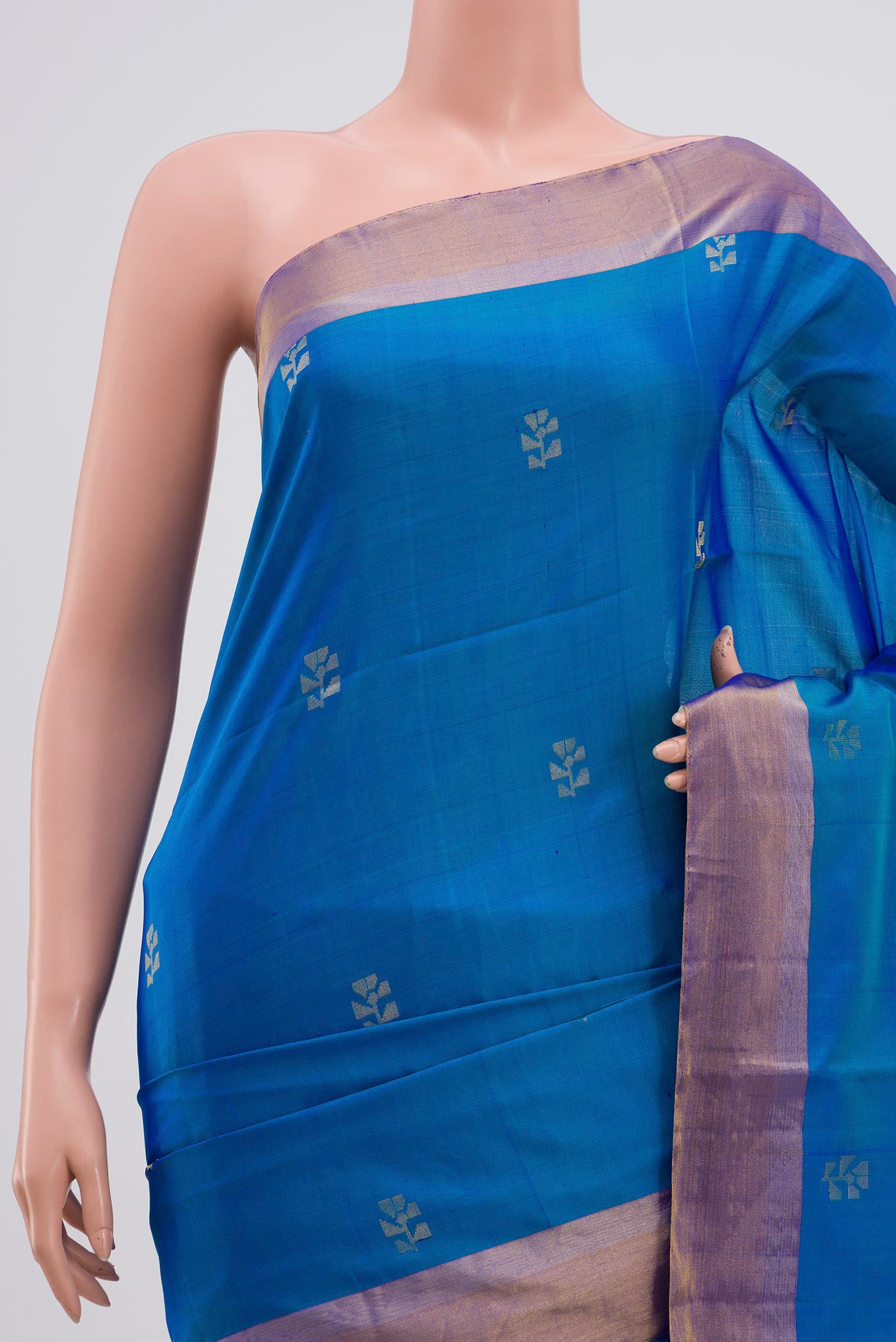 Border image of Light Blue Soft Silk Saree with Zari Butta on the body and Zari Border. 