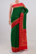 Green Soft Silk Saree with Stripes on the body and Fancy Border.  displayed on a mannequin