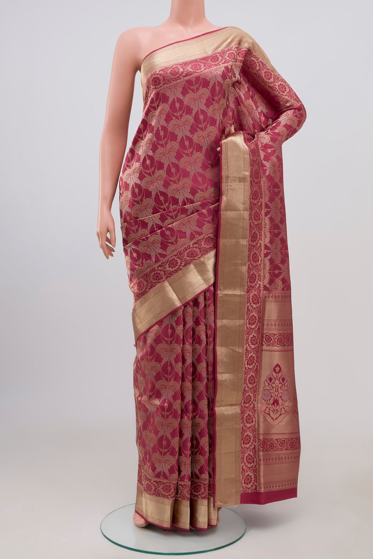 Pink Soft Silk Saree with Zari Brocade on the body and Zari Border.  displayed on a mannequin