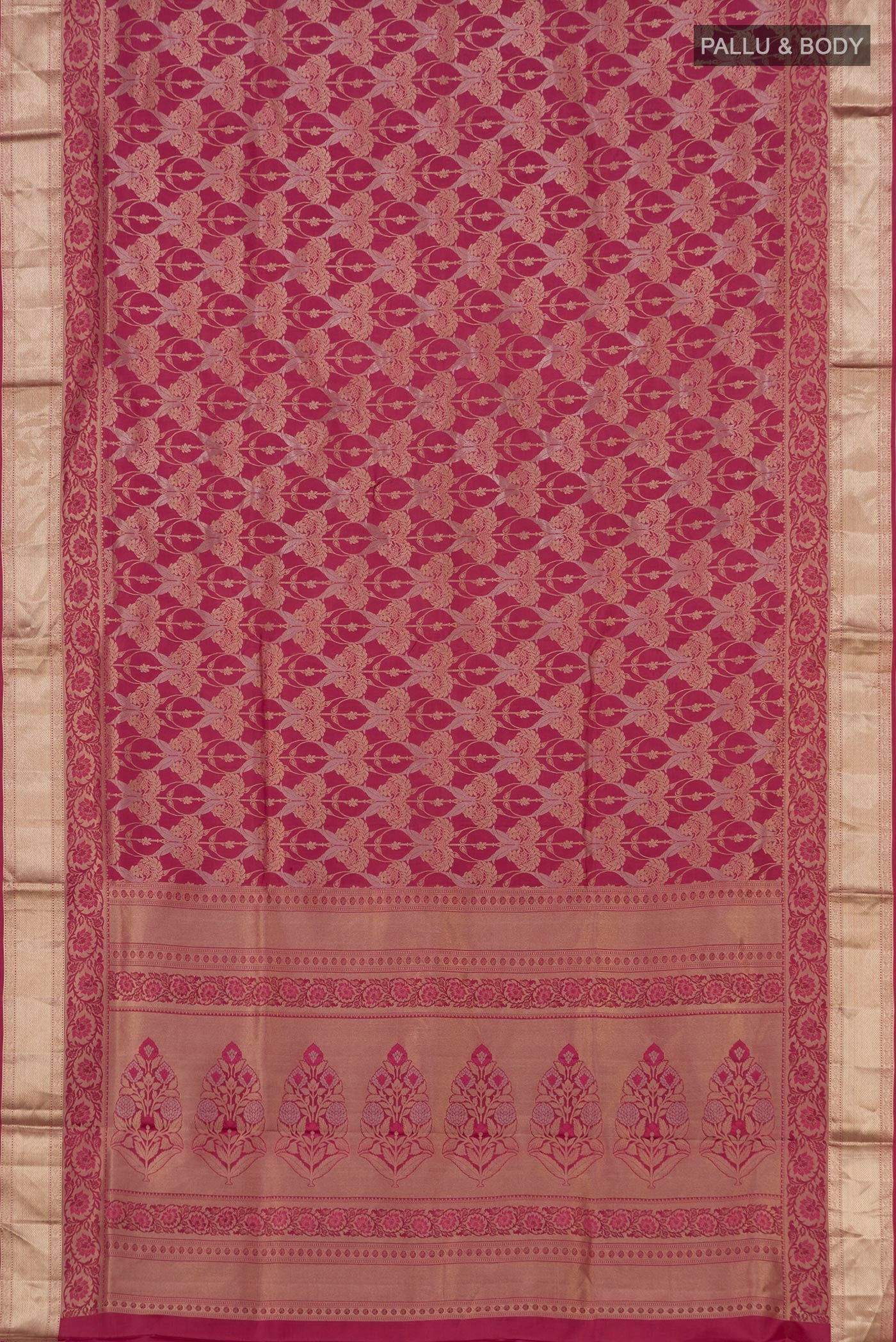 Flat view of Pink Soft Silk Saree with Zari Brocade on the body and Zari Border. 