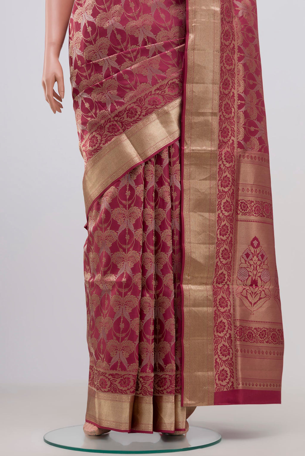 Pleats and pallu of Pink Soft Silk Saree with Zari Brocade on the body and Zari Border. 