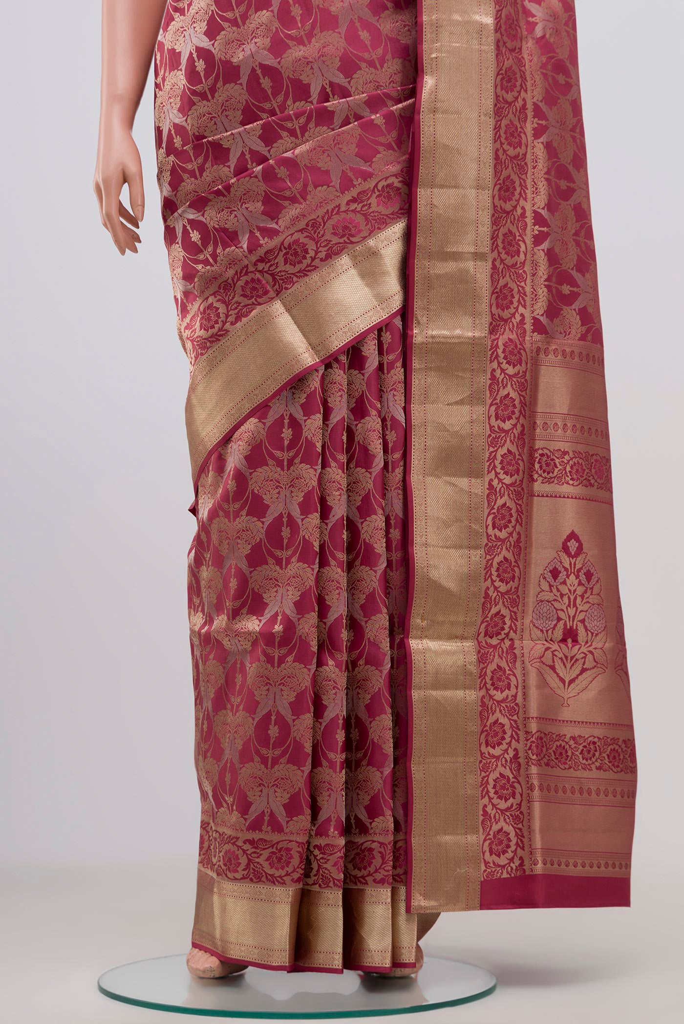 Pleats and pallu of Pink Soft Silk Saree with Zari Brocade on the body and Zari Border. 