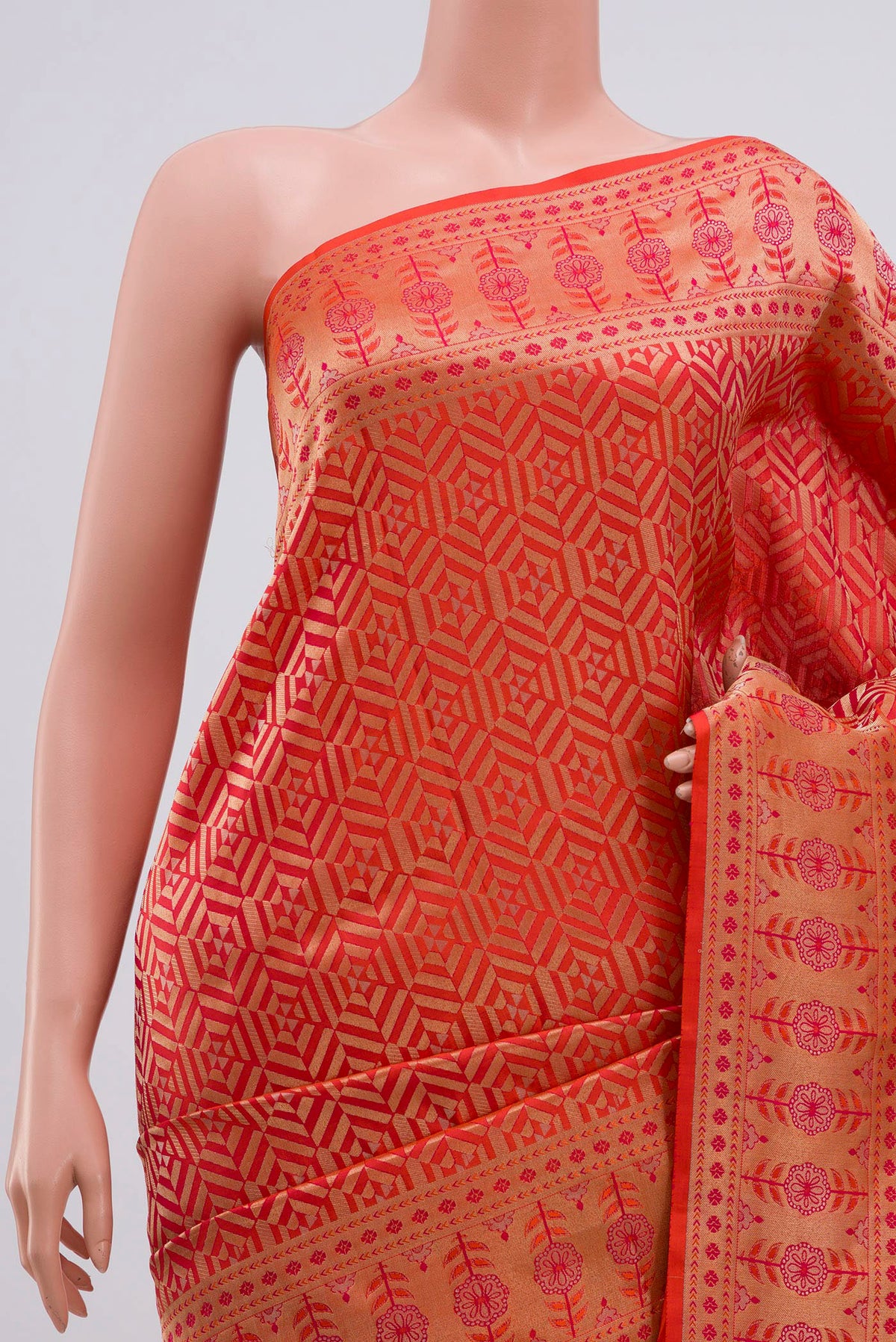 Border image of Orange Soft Silk Saree with Zari Brocade on the body and Fancy Border. 