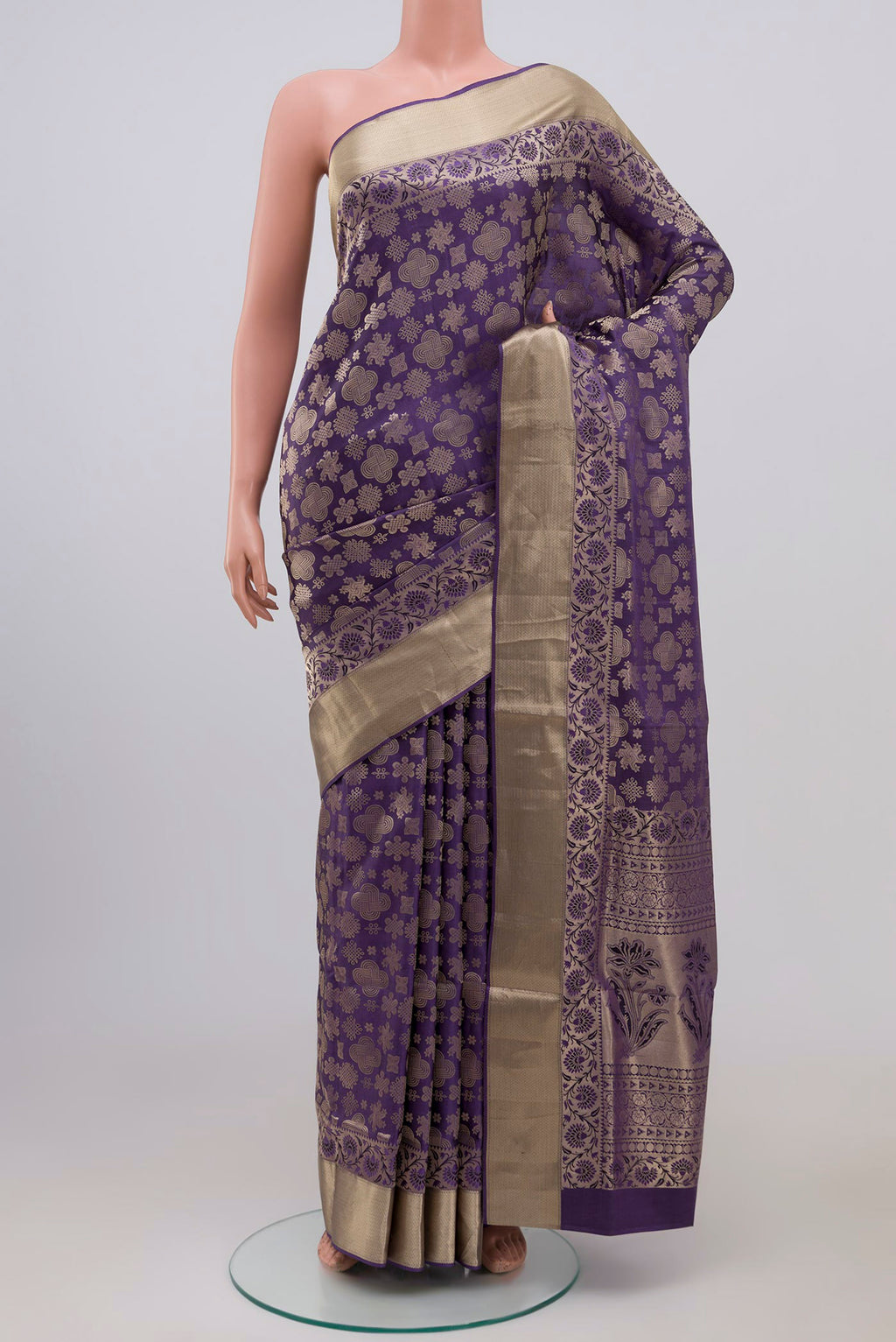Lavender Soft Silk Saree with Zari Brocade on the body and Zari Border.  displayed on a mannequin