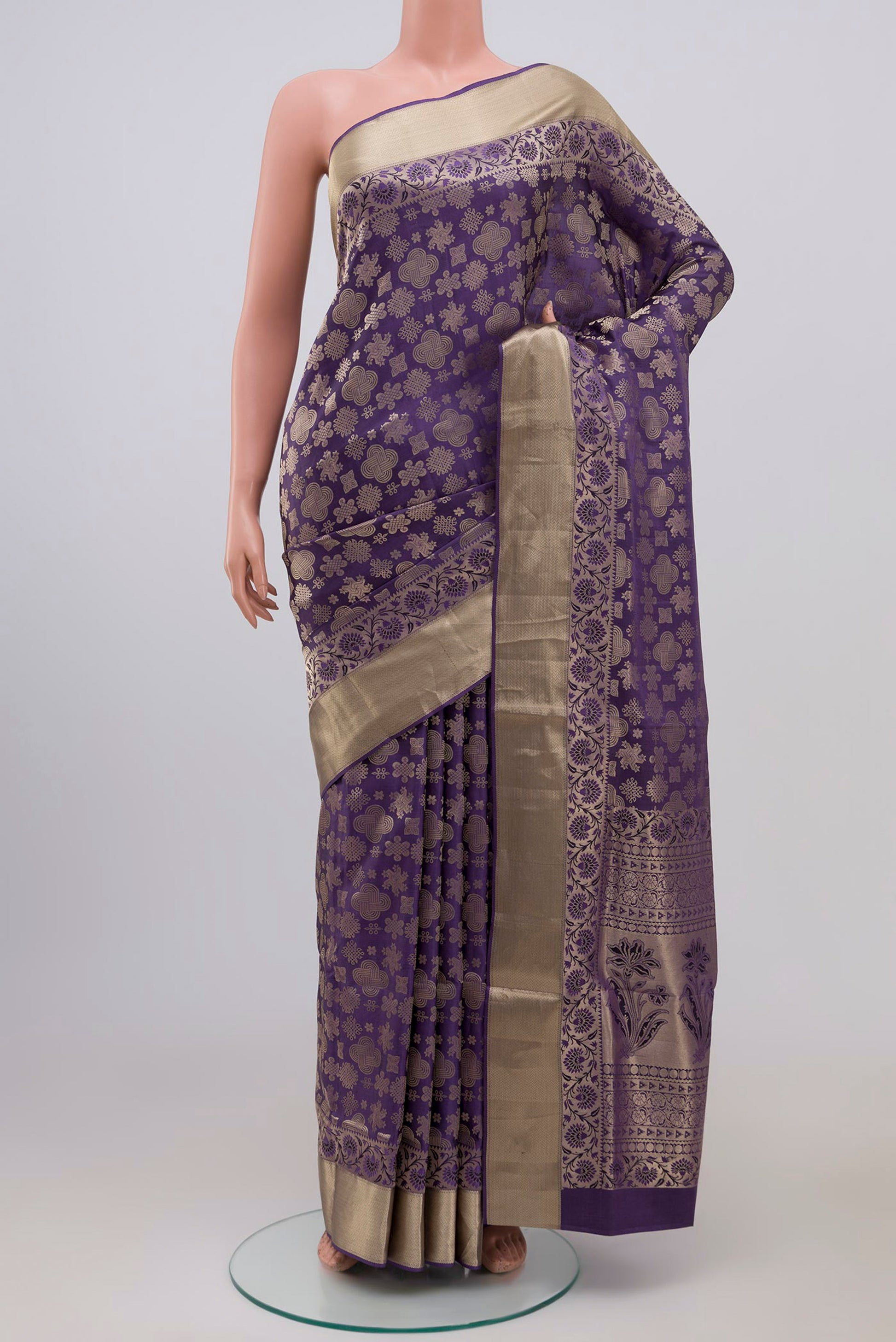 Lavender Soft Silk Saree with Zari Brocade on the body and Zari Border.  displayed on a mannequin