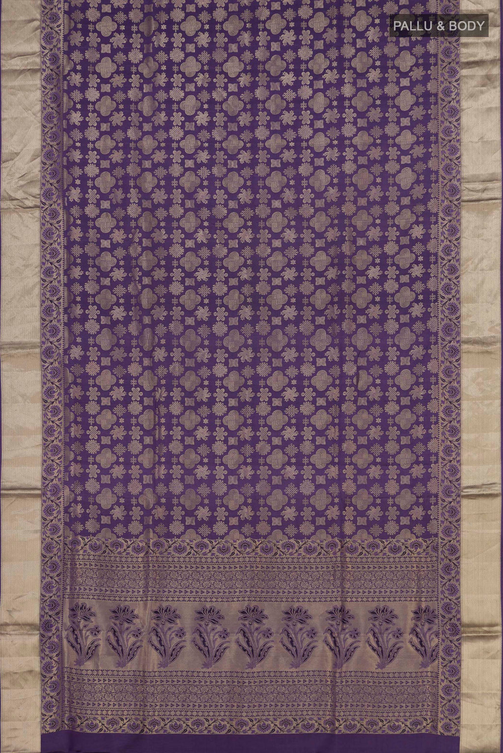 Flat view of Lavender Soft Silk Saree with Zari Brocade on the body and Zari Border. 