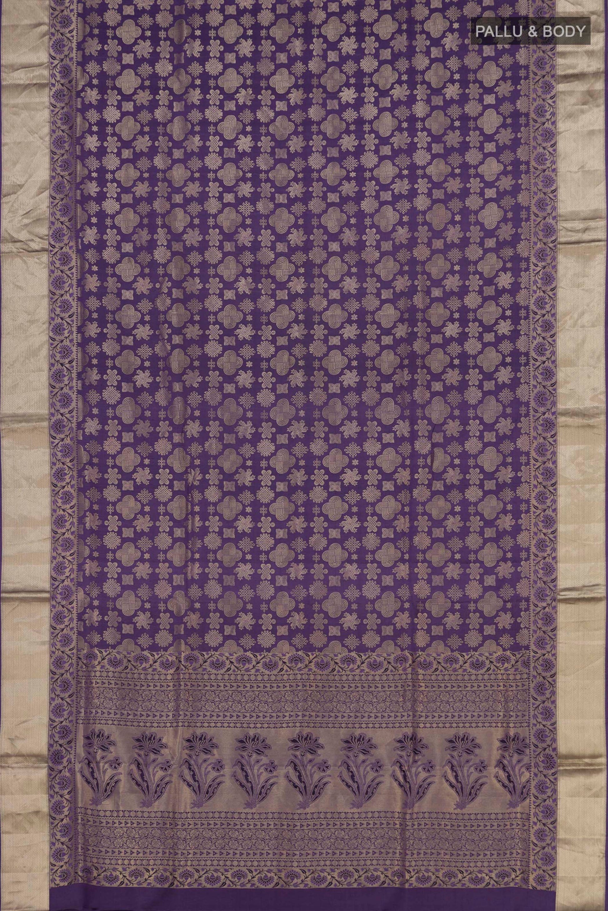 Flat view of Lavender Soft Silk Saree with Zari Brocade on the body and Zari Border. 