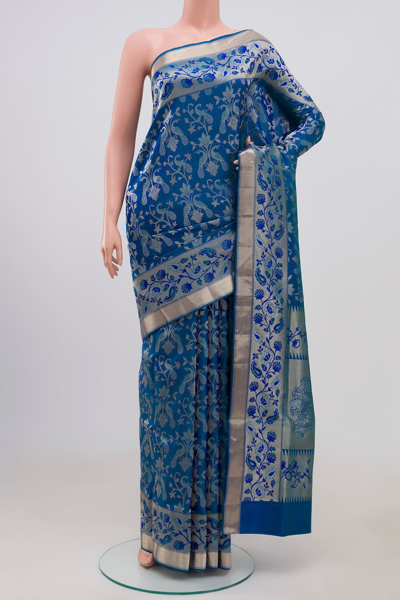 Blue Soft Silk Saree with Zari Brocade on the body and Zari Border.  displayed on a mannequin