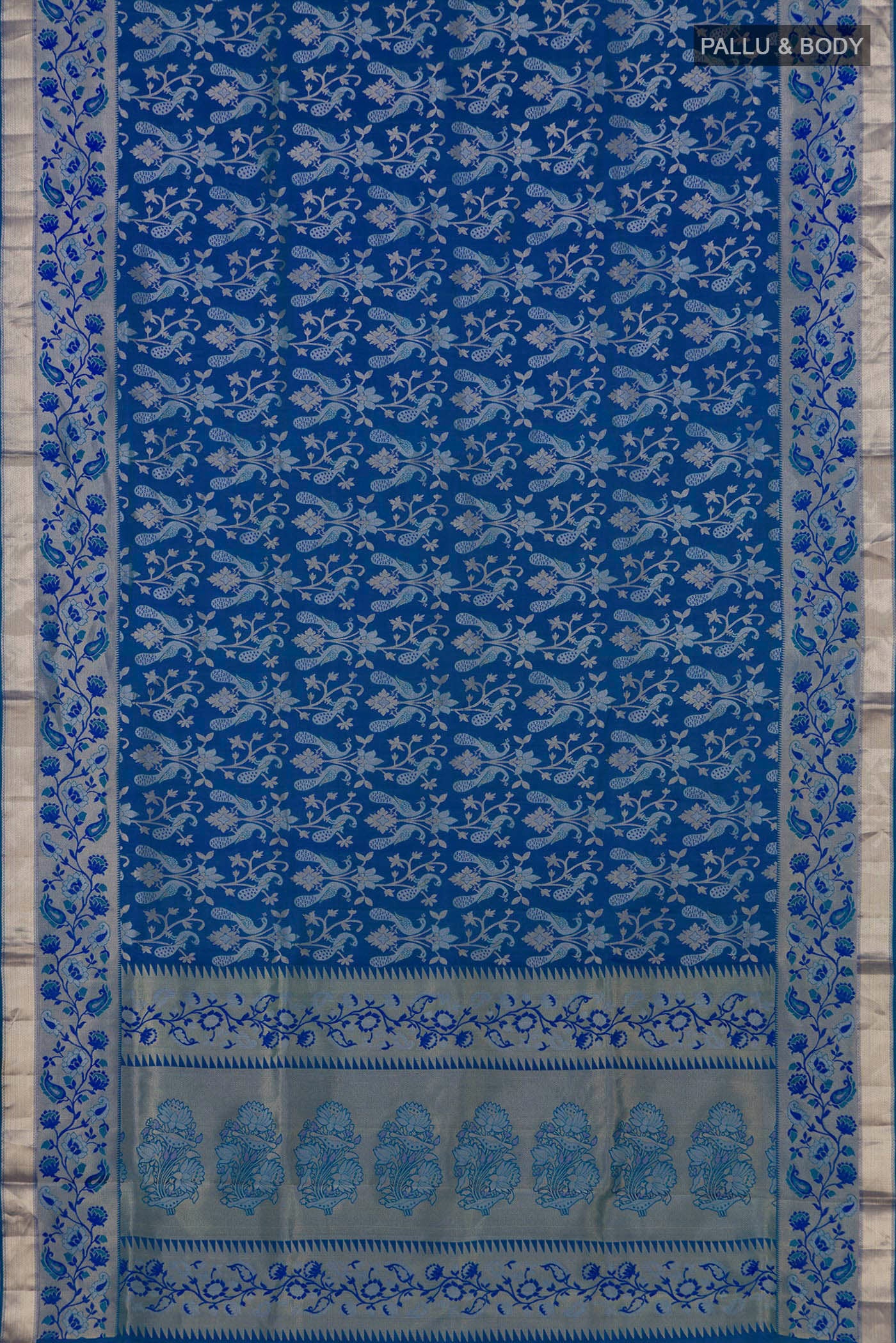 Flat view of Blue Soft Silk Saree with Zari Brocade on the body and Zari Border. 
