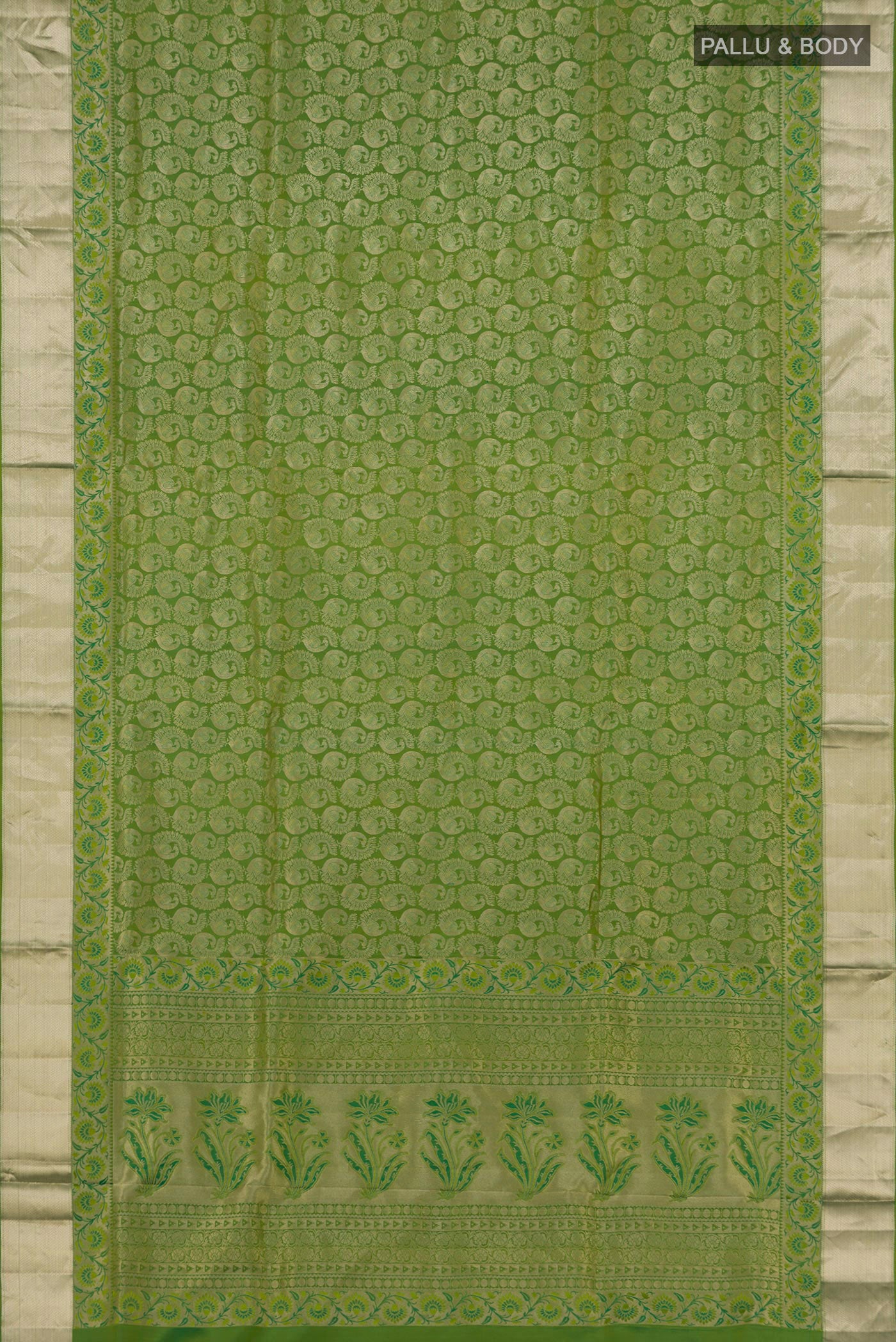 Flat view of Green Soft Silk Saree with Zari Brocade on the body and Zari Border. 