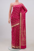 Pink Soft Silk Saree with Zari Brocade on the body and Zari Border.  displayed on a mannequin