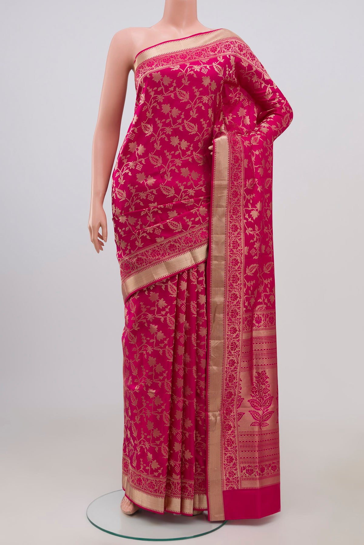 Pink Soft Silk Saree with Zari Brocade on the body and Zari Border.  displayed on a mannequin