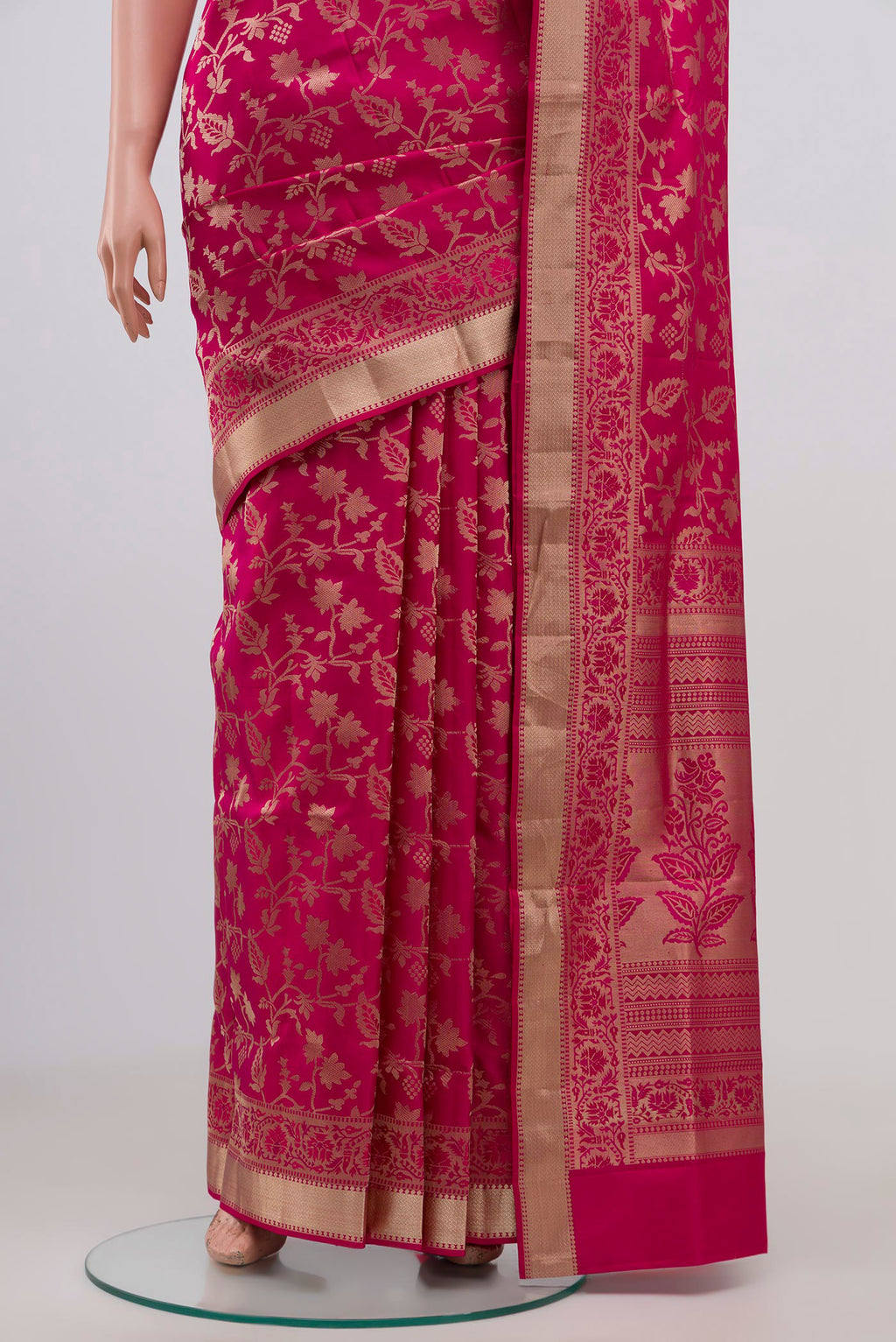 Pleats and pallu of Pink Soft Silk Saree with Zari Brocade on the body and Zari Border. 