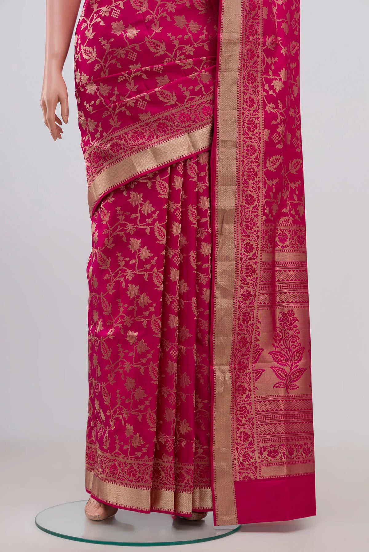 Pleats and pallu of Pink Soft Silk Saree with Zari Brocade on the body and Zari Border. 