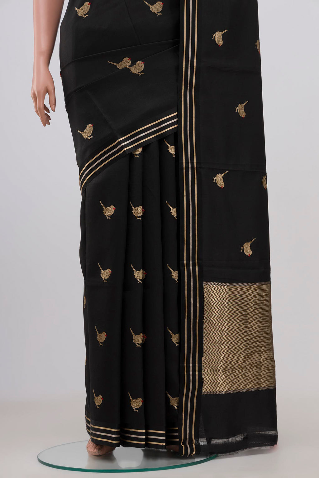 Pleats and pallu of Black Banarasi Katan Silk Saree with Zari Butta on the body and Thin Zari Line. 