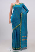 Blue Kanjivaram Saree with Stripes on the body and Zari Border.  displayed on a mannequin