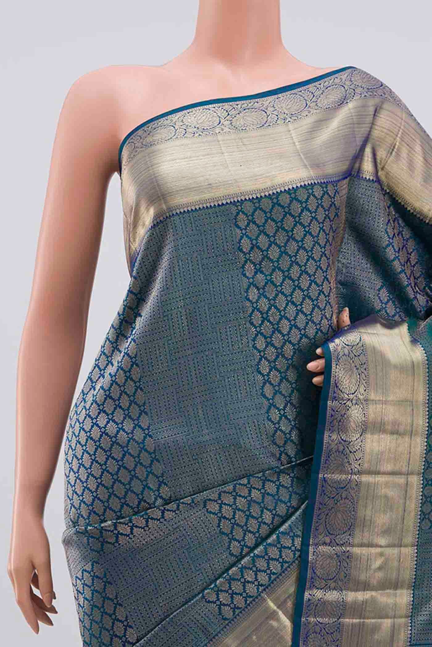 Border image of Green With Blue Color Kanchipuram Silk Saree with Zari Brocade on the body and Zari Border. 