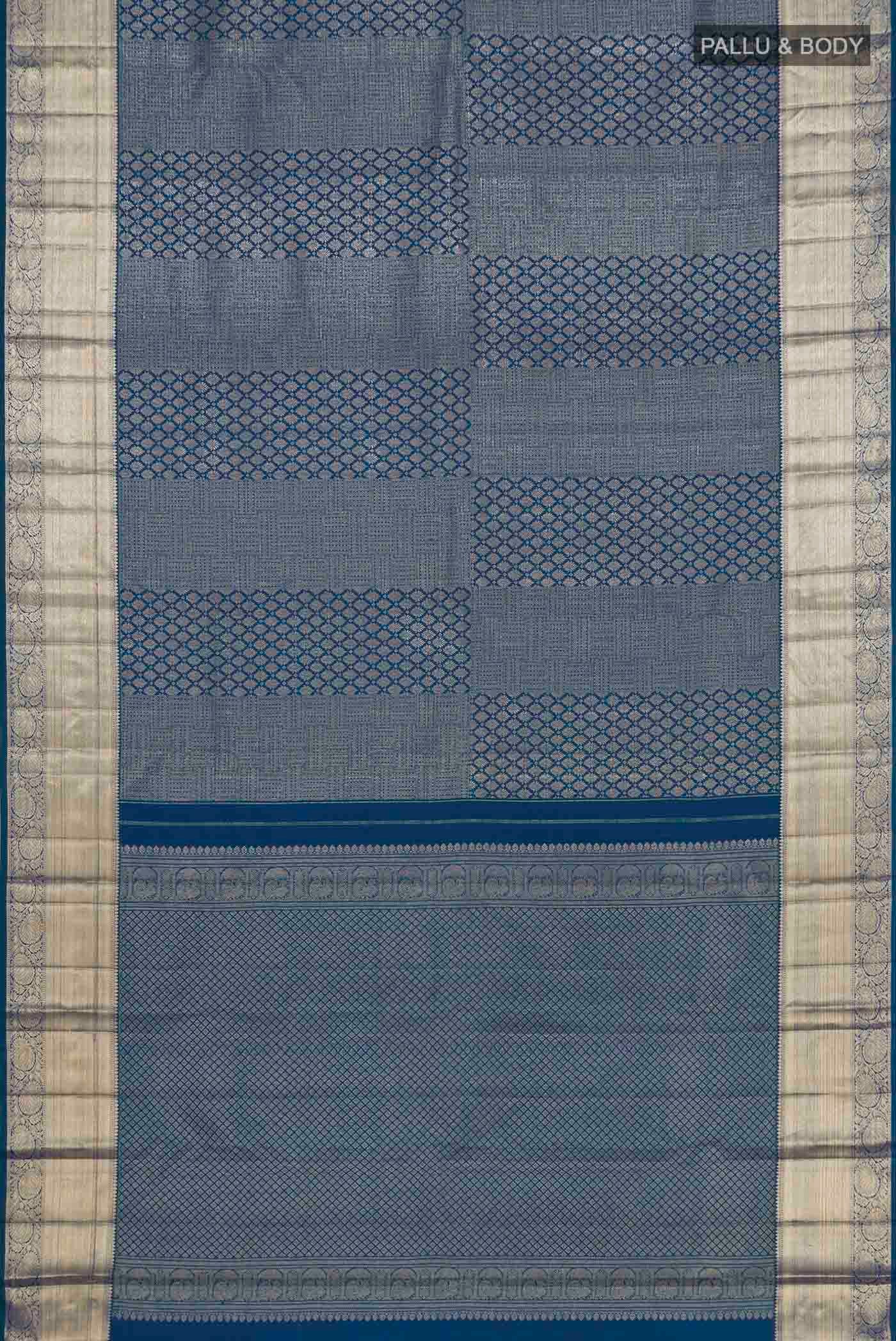 Flat view of Green With Blue Color Kanchipuram Silk Saree with Zari Brocade on the body and Zari Border. 