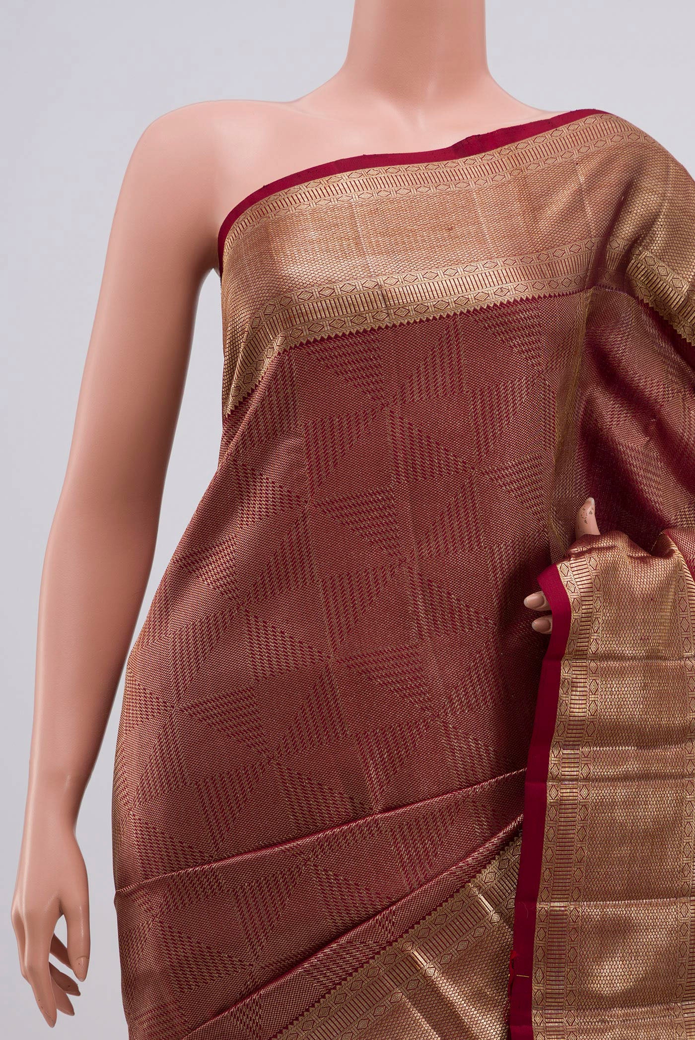 Border image of Maroon Kanchipuram Silk Saree with Zari Brocade on the body and Zari Border. 